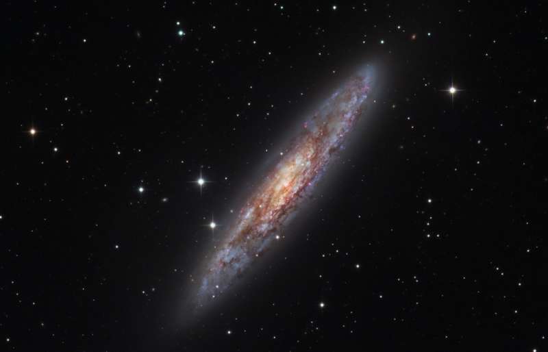 NGC 253: Dusty Island Universe