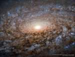 В центре спиральной галактики NGC 3521