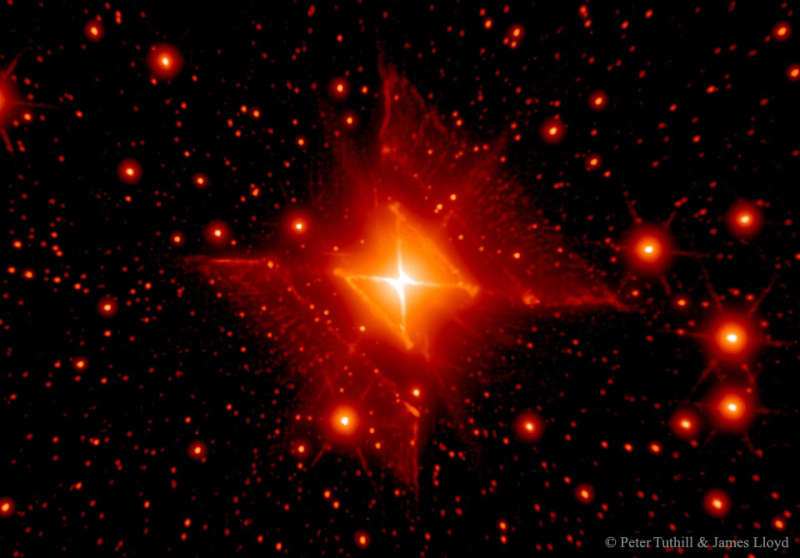 MWC 922: The Red Square Nebula