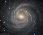 NGC 6814: galaktika s regulyarnym spiral'nym uzorom ot teleskopa im.Habbla