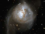 Столкновение галактик в NGC 3256
