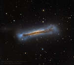 Вид сбоку на спиральную галактику NGC 3628