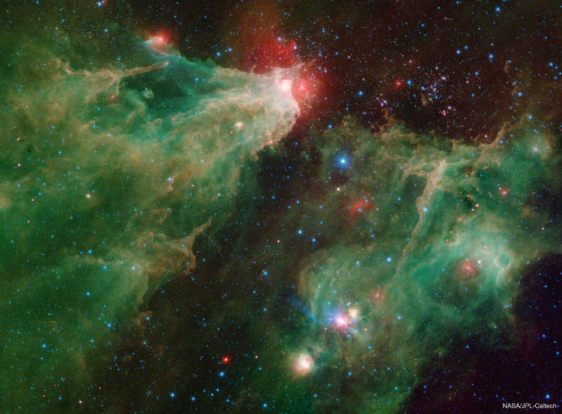 The Cave Nebula in Infrared from Spitzer