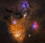 Темная пыль и разноцветные облака около Антареса