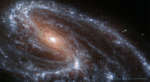Необычная спиральная галактика M66 от телескопа "Джеймс Вебб"