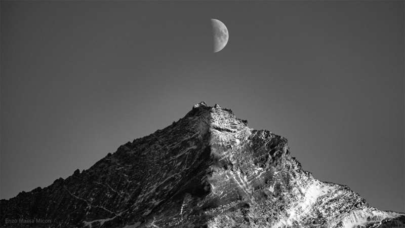 APOD: 2024 January 22  Shadows of Mountain and Moon