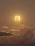 APOD: 2025 July 12 Б Clouds and the Golden Moon